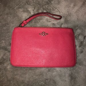 Hot pink Coach wristlet
